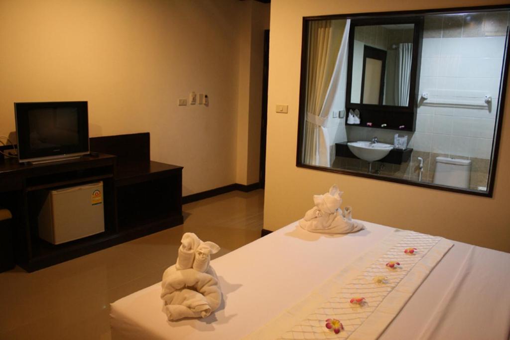 Santi White Hotel Phuket Phòng bức ảnh