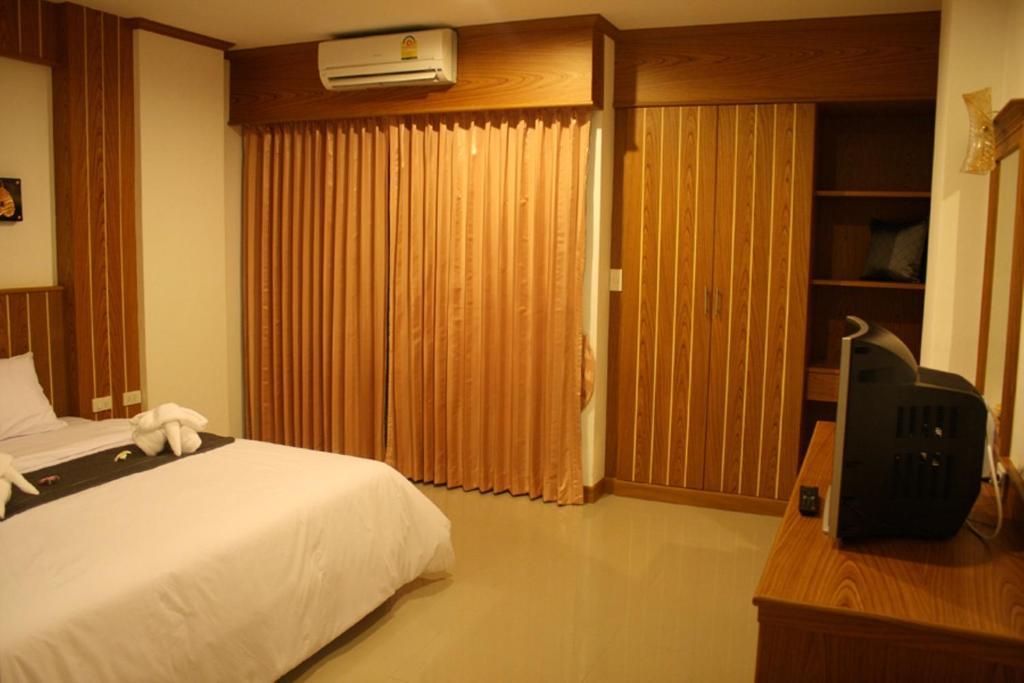 Santi White Hotel Phuket Phòng bức ảnh